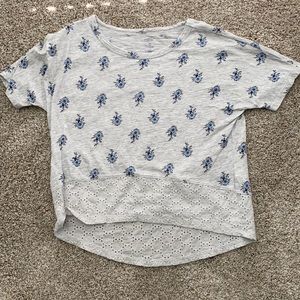 Old navy T-shirt with floral pattern and lace hem. Size youth medium/8